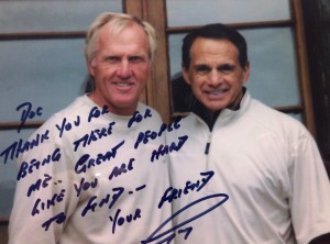 Dr. Maroon pictured here with his friend professional golfer Greg Norman